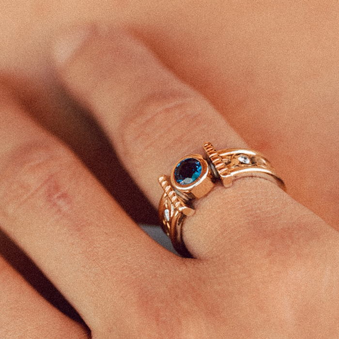 Our Open Rope Engagement Ring is shown here with a sapphire and diamond accents.